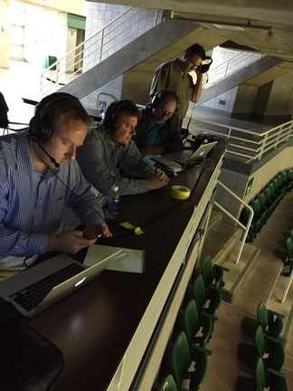 Graham Couch, Joe rexrode, Jack Ebling and Doug Warren chat whle watching practice at MSU basketball media day at the Breslin Center on October 28, 2014.